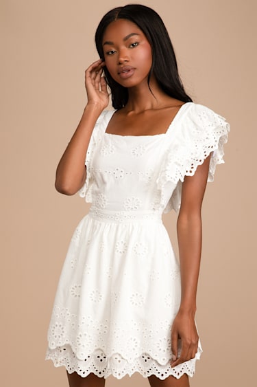 grey lace skater dress ASOS DESIGN Cut Out Side Lace Up Embellished Mini Skater Dress, $90 | Asos