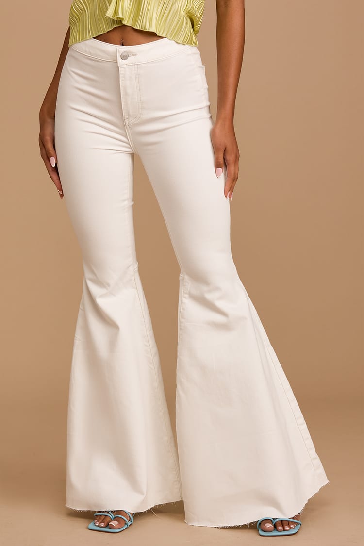 Free People Just Float On Flare Jeans, Storm Reid's All-White Bell Bottom  Jeans Are So '70s Chic, and They're Less Than $80!