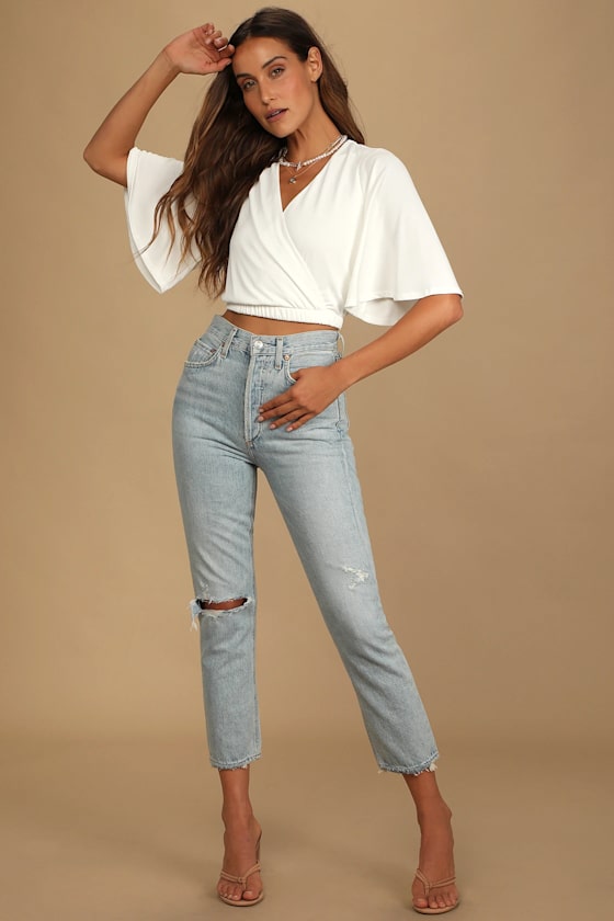 Beauty and a Breeze White Surplice Flutter Sleeve Crop Top 9