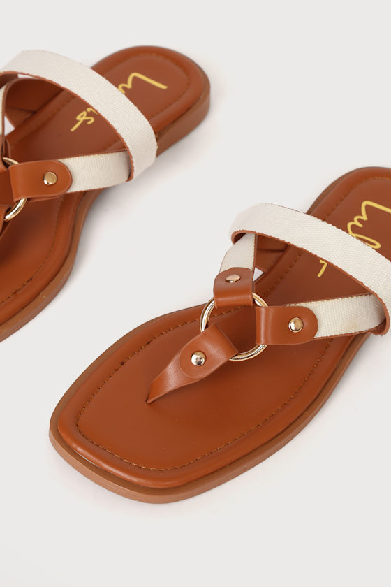 white and tan sandals