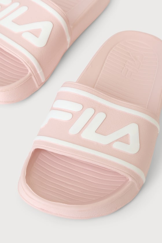 Light pink fila slides outlet