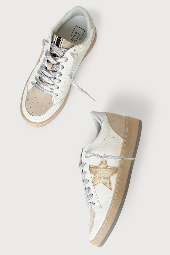 gold and silver sneakers