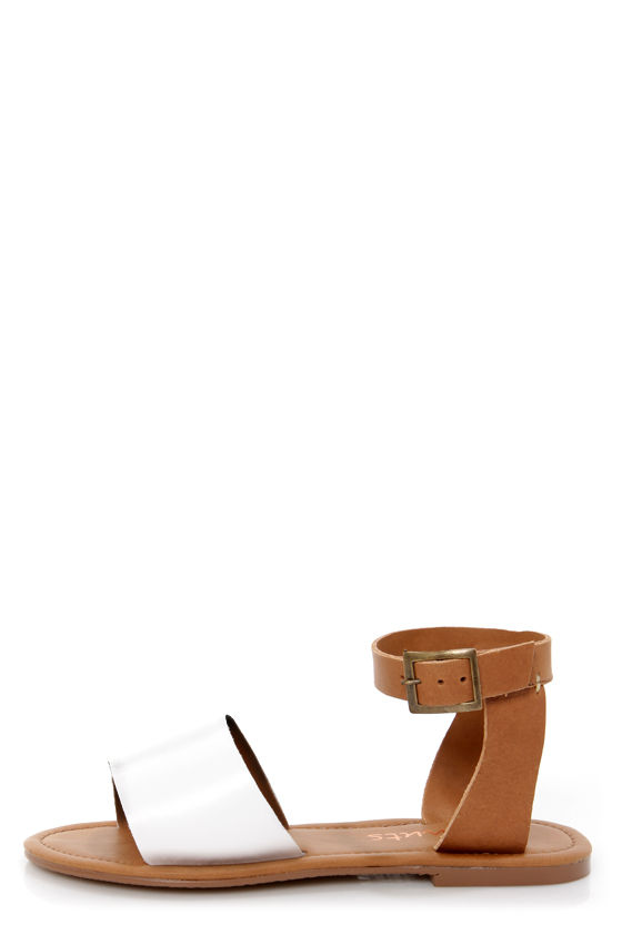 white and tan sandals