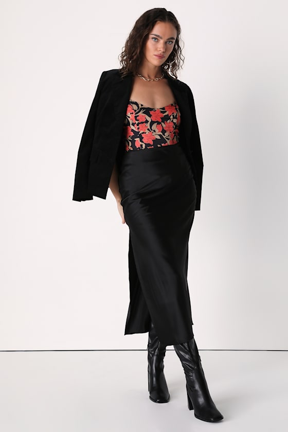 DRAPED BUSTIER BODYSUIT WITH A FLOWER