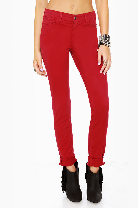 red skinny jeans ripped