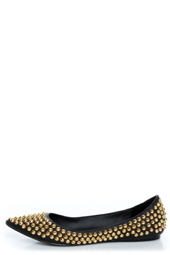 black and gold spiked loafers