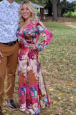 Wow, I LOVE this dress! It's so beautiful and I got so many compliments on it! It was a little long since I'm so short... I got four inch heels to wear with it since I didn't have time to get it hemmed. The heels definitely helped, but I did step on the dress a few times throughout the night. I got fabric tape to keep the top part in place so I wasn't showing too much, and it worked really well with the fabric! Overall, it was the perfect dress! I felt so pretty in it and would definitely recommend it to anyone! The perfect fall wedding guest dress. - Olivia M.