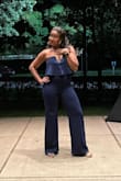 Such a fun piece! Purchased and wore for a wedding and got so many compliments. The fit of this jumpsuit is almost perfect and very flattering. I originally ordered a large based on the size chart and reviews and returned it for a medium. The bust started out just right but got a little loose throughout the night. Overall, 10/10 & would recommend! - Kayla S.