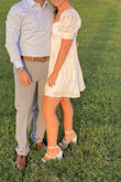 Not the best photo but I bought them for our rehearsal dinner and got a ton of compliments but they were not comfortable at all. After about two hours my feet were KILLING ME. The fit was nice and I liked the heigh of the feel but the bottoms of the shoes are rock hard. The ankle strap is removable so you can wear them with or without the strap which I liked. I will probably wear them again but would not wear if you have to be standing or walking much. - Myrah G.
