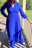 I love this dress! It was perfect for our engagement pictures & was the perfect color match for the wedding. It fit perfectly though a little bit loose which I feel made it flow better. I typically wear a Large so that's the size I ordered. - Jennifer B.