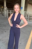 I have ordered a lot & I love the quality of Lulus, so I had to order this pantsuit. the only thing that sucks is the cross back "straps" need to be tighter - i sized down thinking the small would boost some, but it didn't & was a slightly loose. otherwise it was super soft & perfect length standing & with heels! - Morgan L.