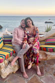 Obsessed with the satin & the gorgeous floral pattern on this dress! Wore it for a beach wedding rehearsal dinner and it was perfect - got so many compliments! I'm normally a M-L in maxi dresses and the medium fit perfectly and was just the right length. The ONLY downside of the dress is that it comes unwrapped very easily, since the tie strings are made of satin. Almost felt like a satin robe at times. If I could figure out a way to make sure the dress stays tied, it would be perfect. But overall, super cute dress! - Kyle D.