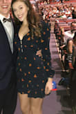 This dress is very flattering and great for formal occasions. It is a little short but nothing unmanageable! Super cute though!! - Sarah C.