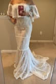 This dress is sooo pretty, fit perfectly, well made , I have to wear a very high heel shoes bc I'm short! - Erika R.
