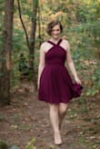 This dress is simple and so cute! The neckline adds a little bit of something to add interest to the dress. It's perfect for my daughter, not too revealing or too boring. The color is beautiful too! - Lora F.