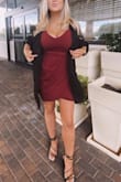 Love this dress so much. It's true to size, stretchy, comfortable, and a beautiful maroon color for fall and winter events. Perfect if you don't want to have to suck in your stomach the whole night because of the way the front drapes. Highly recommend! - Noelle B.