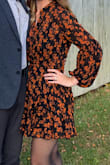 Very flattering. Sleeves are super cute. The top is sheer/a bit see-through, but I didn't feel uncomfortable wearing just a bra underneath and I am usually pretty conservative in how I dress. Perfect for a Fall wedding. I usually wear XS or S... the XXS was the only size available at the time I ordered and amazingly it fit just fine! - Brittany B.