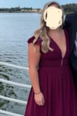 The fit is beautiful, I was worried about having to wear spanx in the Florida heat but I didn't even need to with this dress! The only down side is that I'm small chested and when I danced the sleeves would fall, otherwise this dress was very comfortable! Perfect length with heels on. - Anna K.