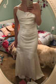 This dress is gorgeous. The fabric is heavier weight and feels very high quality, which can be hard to find with satin. I'm 5'7, 135 pounds, and I got a S. It fit like a glove. The back is my fave part! - Gabi C.