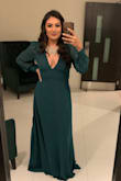 Material was great. Dress looked very elegant. Dress was a little long for me.. I recommend wearing very high heels or getting it altered. - Kristina V.
