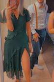 Got this dress for a fall wedding. I bought it because I loved the ruffles and the color. The quality of the dress is amazing and it's very comfortable to wear. I had to alter it a bit in the bust because it was a little saggy, but it fit beautifully everywhere else. I will definitely be wearing it again! - Emily J.