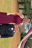 I actually wore this dress as my wedding dress. I didn't want to go the traditional white route as most brides do and I thought burgundy would be just right for my fall wedding. The dress is simple yet elegant with just the right amount of lace up top and the open back is a very nice detail. The dress runs true to size but it is very long so either wear heals or have it hemmed or you will be tripping over it. All in all a very gorgeous dress! - Nicole B.