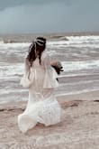 This dress is beautiful and fit perfectly. - Ashley H.