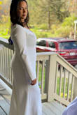 Ordered the XL because Large wasn't available. Could've definitely ordered a medium. Had the dress altered to fit my body. Great material, wore some spanx underneath to smooth out a little. Kept me warm during my October outdoor Berkshire wedding. - Amanda M.