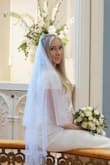 I had a small intimate ceremony for my wedding and this was the perfect veil for it.

Since it's a double veil it gets a bit fluffy in the back if you keep it as it comes, so I changed the length in both the front and back a bit. - Wiebke R.