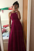 I love it! The color is the same as the picture. I always buy Lulus dresses, the quality is excellent. The length is a little long for me. I thought that the front it would be straight, without curves, because I don't have much bust. Instead, the dress valued my curves. - Larissa H.
