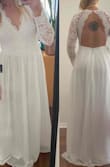 Loved the way the top fit and accented my back. Skirt is fine, but would love if there were more lace. Skirt was good length, won't need to shorten it at all. 

The skirt fits a little loose, but top fits great. Dress is very white, I tend to love ivory/off white dresses, but the fit was so great I'm still definitely considering this dress. - Megan J.