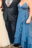 Loved this dress! Fit perfectly!  Has adjustable straps and the strings in the back can be tightened or loosened.  It was a little long though. - Jacqueline A.