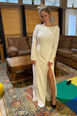 This dress is stunning and the material is amazing. I ordered a Small like most things I wear and swallows me. So we are going to try and get it tailored to see if I can still wear it. I'll always say the lace in the back is super cute but doesn't look expensive. The fringe on the ends gives it a cheap look so I'm cutting that off. BUT all in all it's a beautiful dress just needs some tweaking. I attached the first pic I took in it. It's so pretty. Just too big for me. - Tori H.