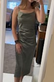 The material is so smooth and feels so luxurious! I bought it for a wedding, and I felt so beautiful in it! The ruching in the dress was a little awkward in the dress but steaming it seemed to make it sit better! Overall, I am absolutely in love with the dress! - Katie M.
