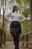 I bought a large in white and a medium in black to see which fit me best and the medium is perfect! The large still fit fine but the arms are very long and I have the roll a lot of the material up. If you are between a medium/large go for a medium! - Amber R.