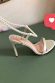 These shoes were so cute on! A great pair for any bridal events. Do note that they are more of an ivory shade and not white. Definitely size up a half size. I'm usually a 7, and ordered a 7.5 and they fit great. - Itzel A.