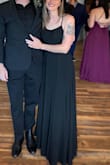 I ordered this dress as a guest to a wedding. The bottom of the dress is very wide/a lot of fabric and also very long so I got it hemmed. Overall I was generally dissatisfied as the night went on. I didn't fill out the bust and there is no support at all so the chest was gaping. If I tightened the straps to try and fix that issue, they were too tight and cutting into me. The way the top is designed, the shape on the side of the bust area made it hard to add cups because they would stick out, and when taping my chest for a little lift the tape would show. The slit up the front looks gorgeous in the model photo but when I was dancing I nearly flashed my hoohah to everyone so I had to hold the slit closed. I really wish I could return the dress because I'm 100% certain I'll never wear it again. Looks fine in photos tho. - Jodi D.
