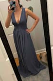 This dress is beautiful and I love the color. Quality is really nice too. However, I ended up returning it because it's several inches too long. I'm 5'6" for reference - photo is without heels. - Lauren D.