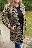 Very nice, and good quality. I ordered a large, as I usually have to size up in coats, due to my broad shoulders and it fits perfectly. I usually wear a medium in tops. Both my friend and husband said it needed a big button, for extra finishing. It does not close or button FYI. I bought a couple of buttons to try but decided it did not need one after all.
Tip: I always scotch guard my coats, shoes, and bags. Keeps them cleaner longer and I have less worries about spills or rain marks(on leather). - Traci K.