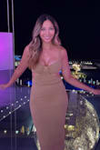 This was a perfect dress to wear to my 43rd birthday celebration in Cabo. Yes, the material is a thick, weird sweater material and the color in certain light looks like vomit. I almost returned it but I knew when I put it on it'd photograph well especially if you have a nice tan. Oh, wearing Spanx underneath made it look so much better! - Enrilynne P.