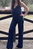 Loved this jumpsuit! Got many compliments on it and loved being able to easily dance in this at a wedding. I did get it hemmed since I'm shorter, but I expected I would need to do that. - Brynne D.