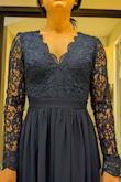 Beautiful dress. I sized down to XS based on reviews and it's almost perfect. I'm normally Size S due to my hip. XS fits the top perfectly. However, the waist is a tad tight since it doesn't stretch. The lace is beautiful and the length is normal (too long for me but I'm petite size). I wish LuLus will carry dresses with pockets. Other than that, almost perfect dress. - Vicky L.