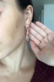 These are so cute. They're the perfect size and subtle because they're see-through. I think they look way higher quality than the price would lead you to believe. Not heavy on my ears at all- highly recommend for more subtle statement jewelry. - Tori M.