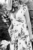 This dress is very light & flowy - perfect for summer! I wore it for my engagement photos and it was great with the exception of the cleavage area being a little large. I would not have gotten a different size but in some poses my bra was exposed. - Kimberly S.