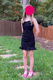 Perfect fit. Modest but the ruffle adds a little fun. The length was to the top of my knees but I adjusted the straps as tight as they would go and scrunched up the sides a bit. It was just the look I wanted and was comfortable too. - Kelly N.