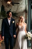 This dress is absolutely stunning and photographs so well. I was so nervous about ordering such an inexpensive wedding dress online but I was beyond impressed. When the dress came it was in a really nice garment bag and was packaged beautifully. The dress fit me perfectly and needed no alternations. I was very nervous about the sheer top but it has all the right padding in all the right places. This dress is also extremely comfortable and I was able to move and eat at my wedding. This was the perfect dress for my wedding. - Jenna G.