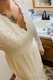 Good quality, heavy material. Order your regular size. It runs a tad larger - but it fits better than being too small. Super pretty and long and you can wear without a bra if you choose. - Stephanie S.