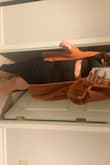 Material stretchy, the skirt fits nice! It is true to size. The skirt those start going up when you walk. - Sasha G.