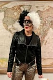 I've had my eye on this jacket for a bit, and I used Halloween as an excuse to finally get it! Great quality. I sized up based on other reviews and it was still slim cut and flattering. You probably wouldn't be able to layer on anything thick underneath this, regardless of size. - Danielle B.