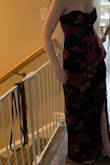 This dress would've fit me without alterations if the seam on the top of the dress (bust seam) wasn't defective or just ill fitting, it flips over no matter how much I fiddle with it. It's beautiful in person, but if I keep it I need to have it fixed. It's a smidge tight, but wouldn't size up because it's strapless and it needs to be snug. - MEGHAN S.